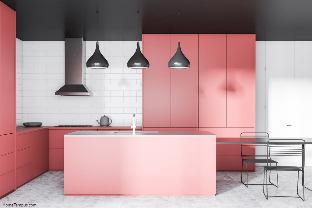 What Color Cabinets With Gray Floors - Interior of modern kitchen with white brick walls, concrete floor, pink cupboards and countertops, pink and gray island with sink and black table with chairs