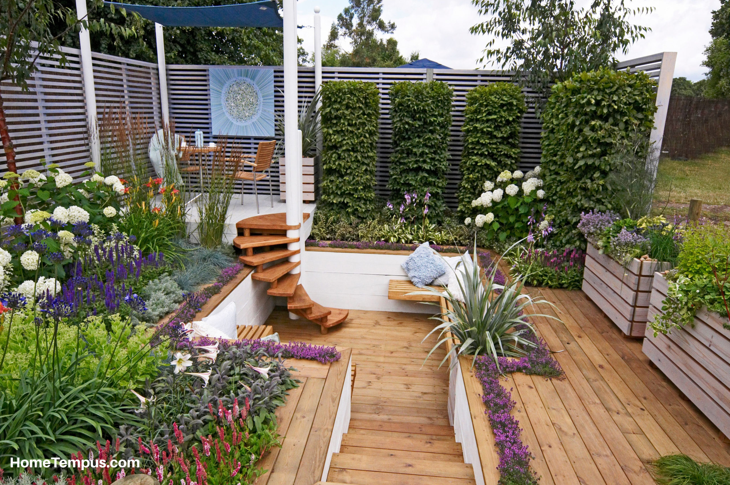 Urban style garden with seating and decking.