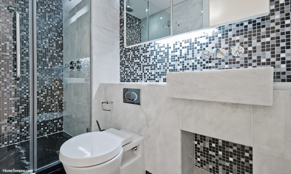 Modern luxury bathroom with floor to ceiling mosaic tiles